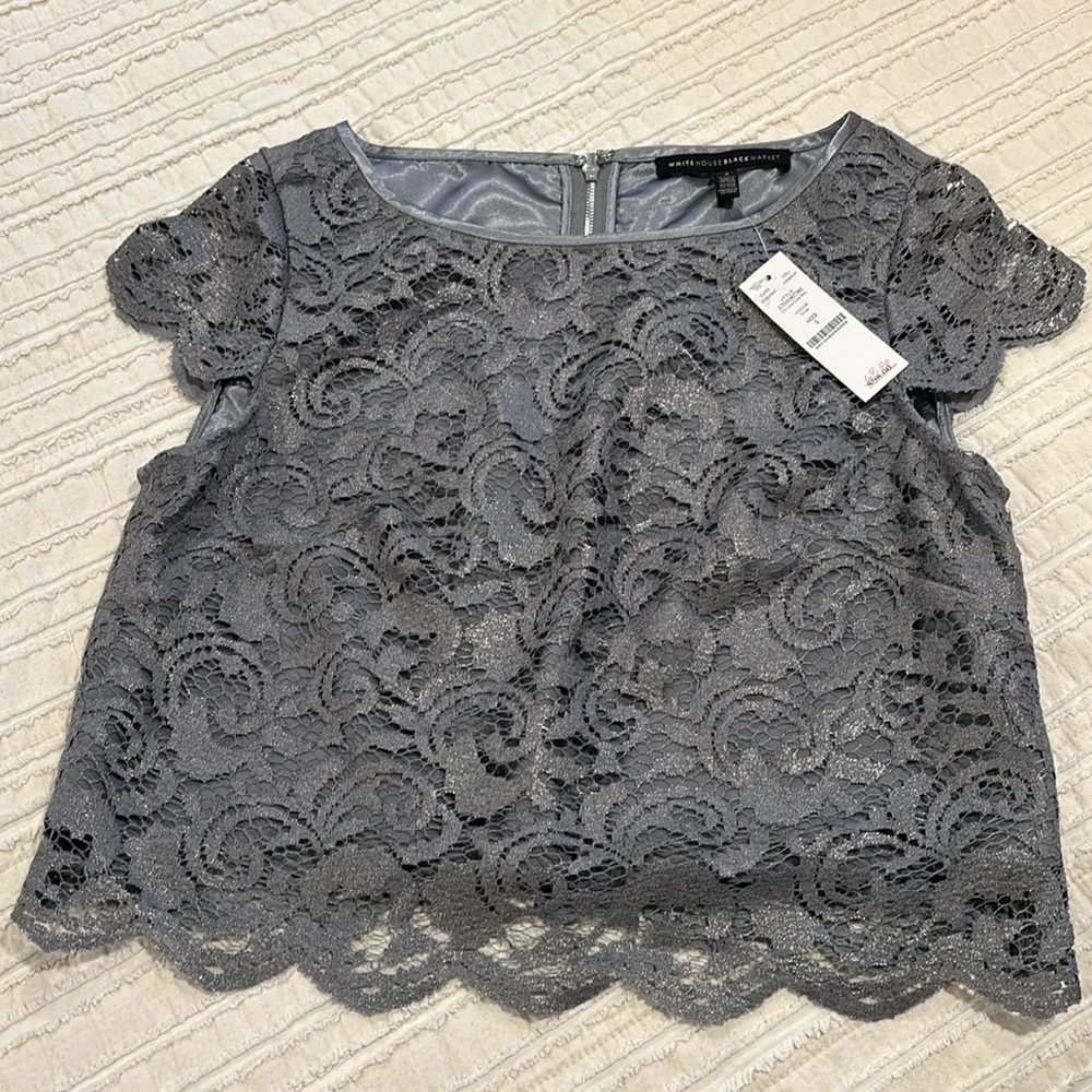 Blouse fully lined with lace overlay